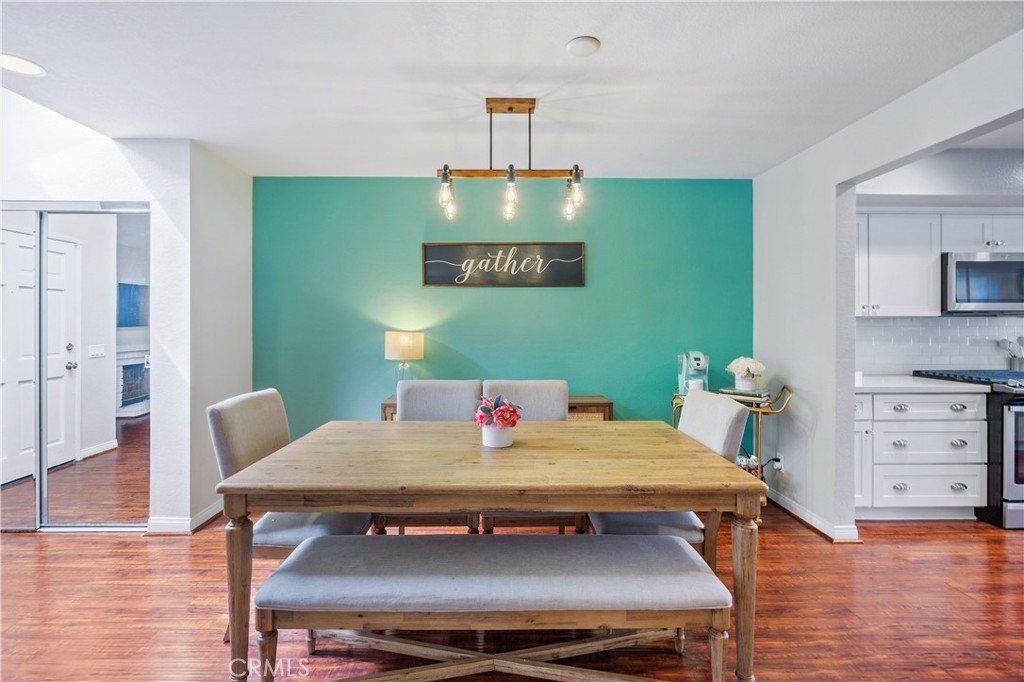 8520 Lake Knoll Avenue, Unit B Garden Grove, CA 92844 - Photo 8 of 31 a view of a dining room with furniture