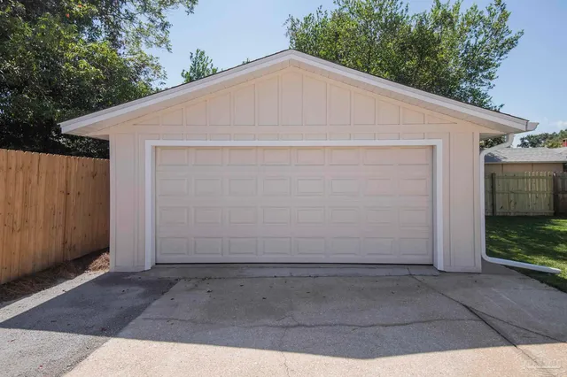 a white house with a outdoor space