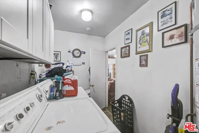 a bed room with a bed and a lamp