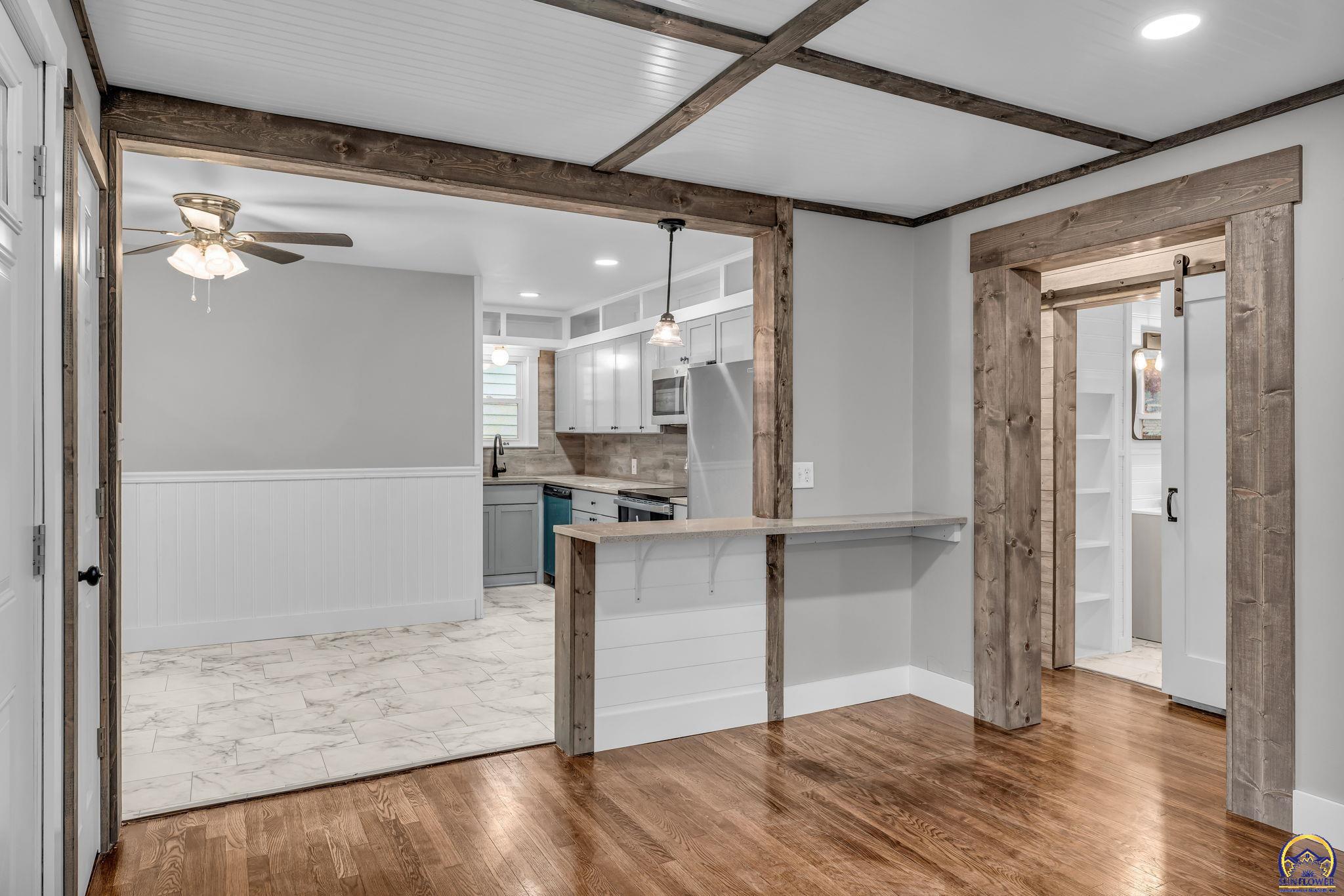 2212 Southwest Plass Avenue Topeka, KS 66611 - Photo 16 of 29 Living Room Looking into Kitchen