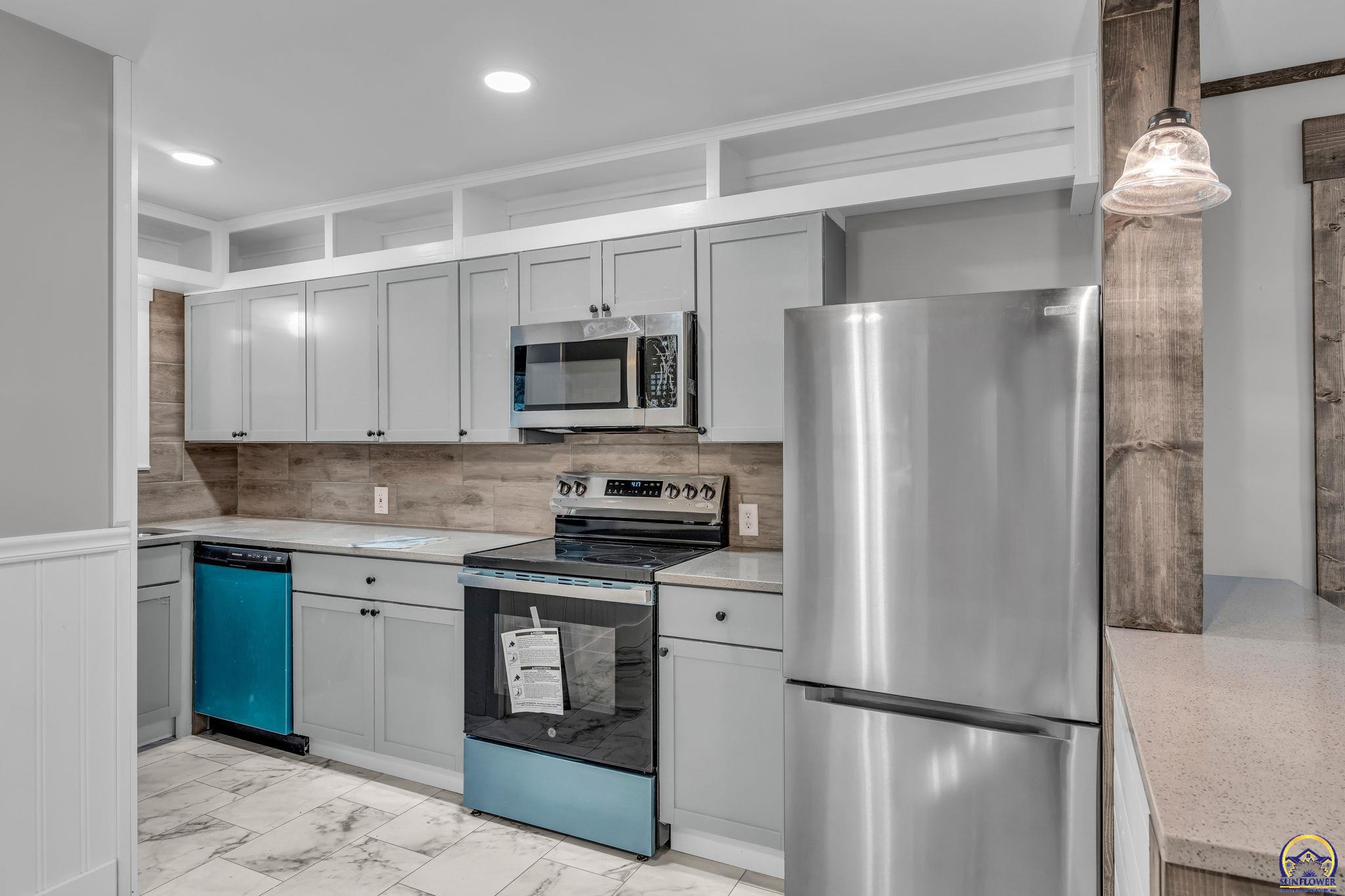 2212 Southwest Plass Avenue Topeka, KS 66611 - Photo 18 of 29 New Kitchen and Appliances