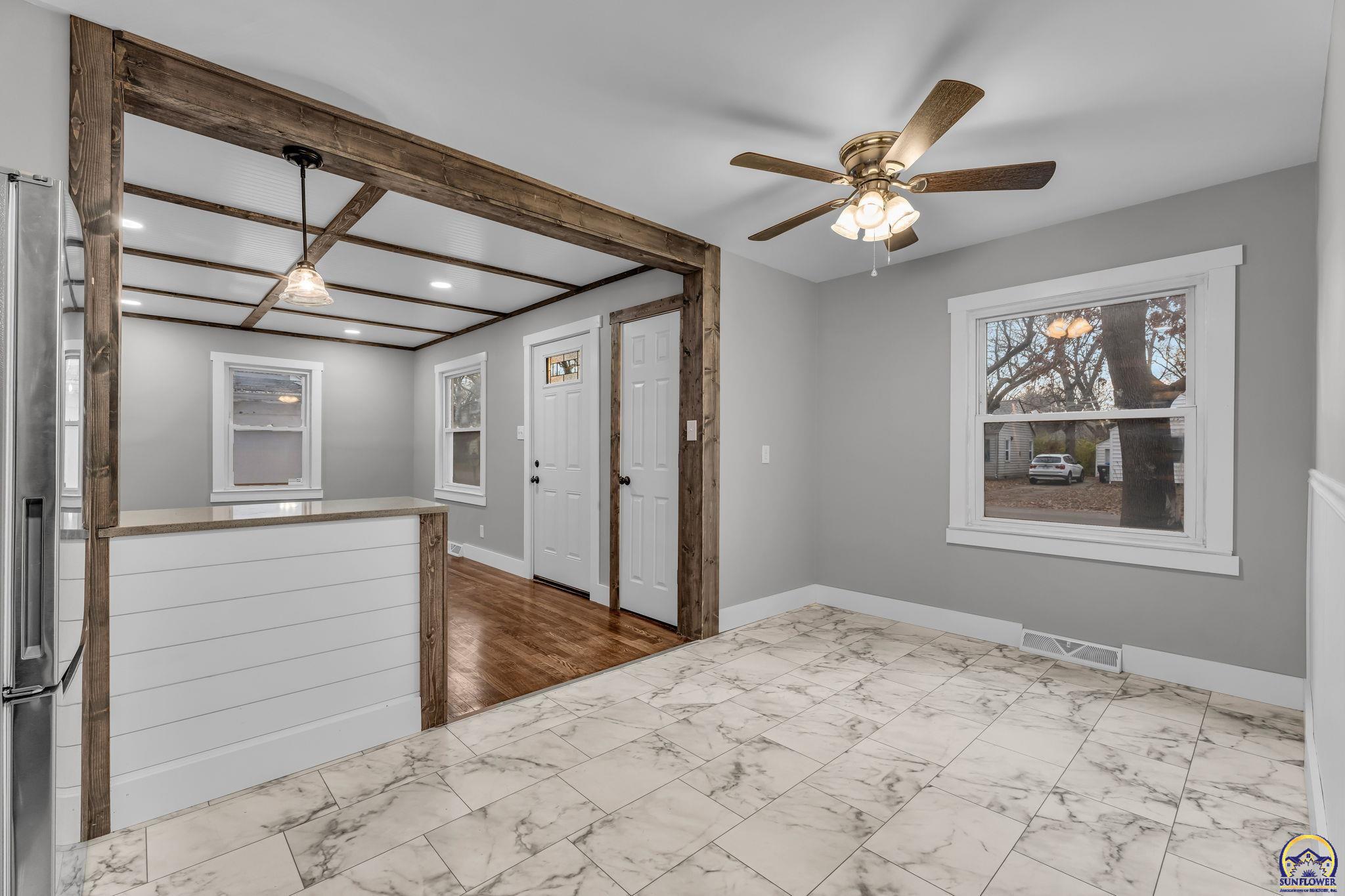 2212 Southwest Plass Avenue Topeka, KS 66611 - Photo 20 of 29 Dining Room looking into Living Room