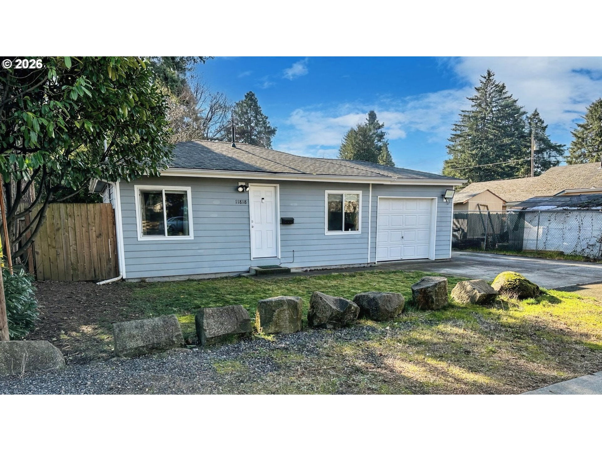 11818 Northeast Holladay Street Portland, OR 97230 - Photo 2 of 26 a view of a house with a yard