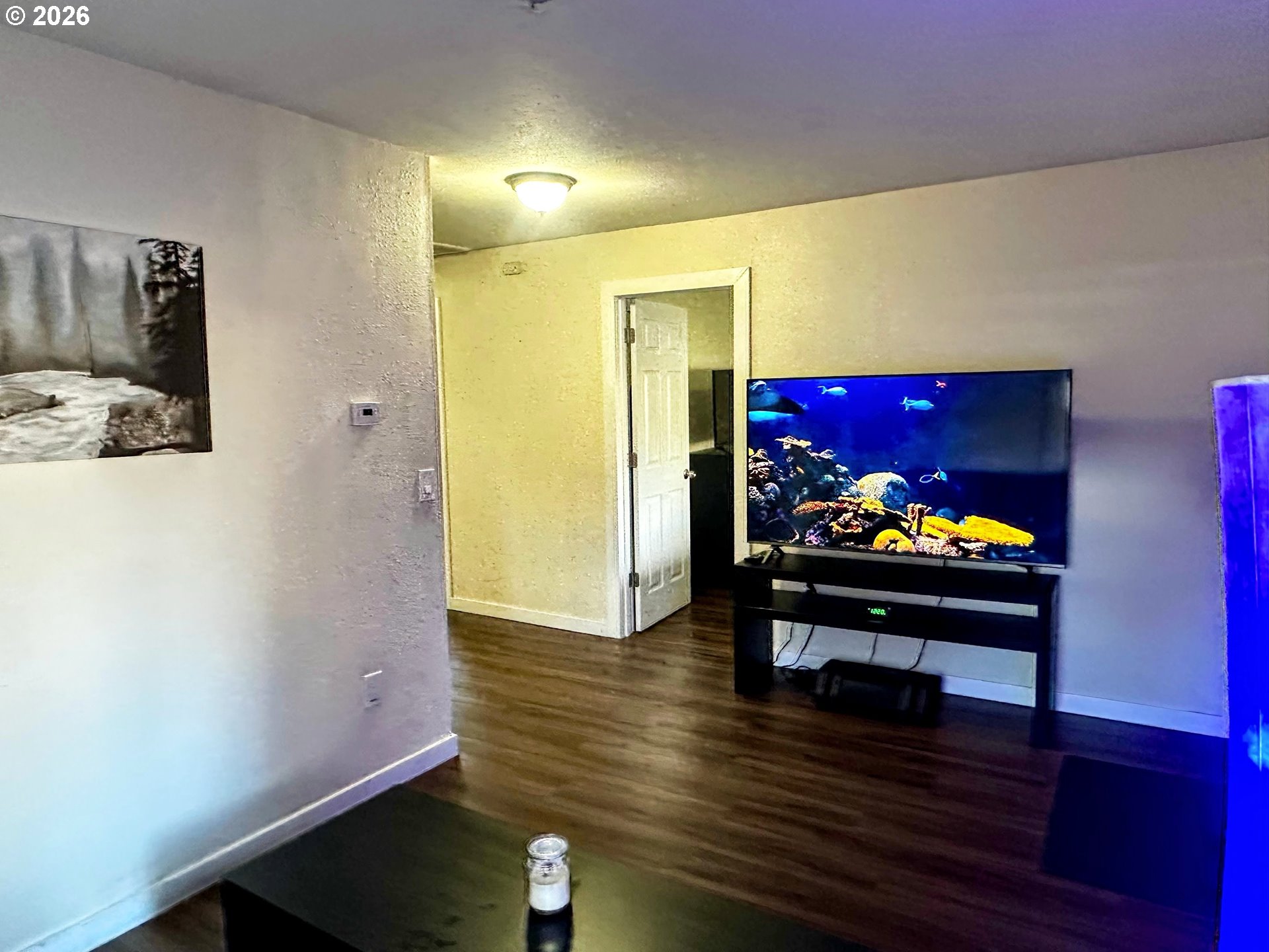 11818 Northeast Holladay Street Portland, OR 97230 - Photo 4 of 26 a view of a room with furniture and wooden floor