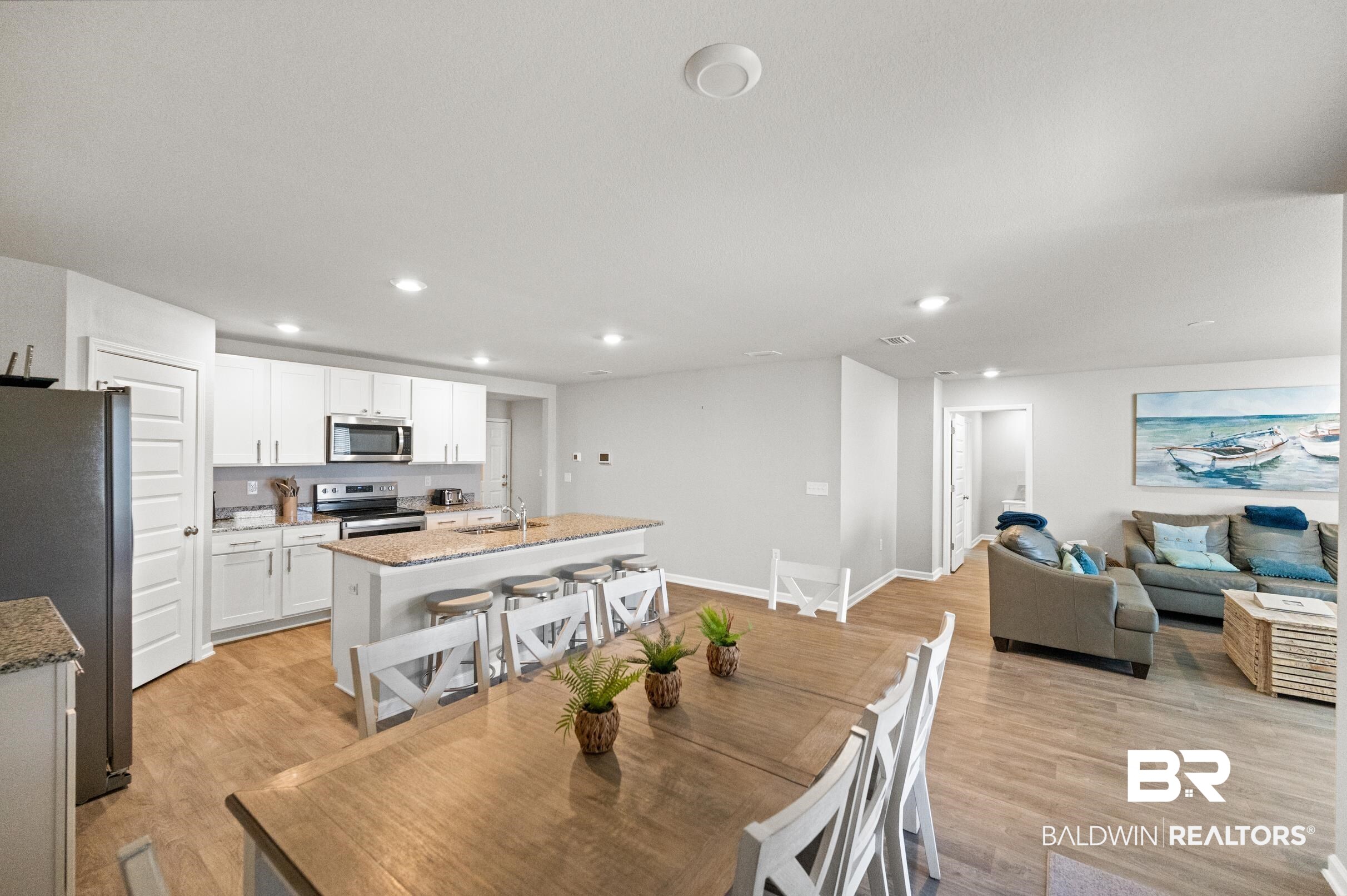7425 Coppin Drive Foley, AL 36535 - Photo 11 of 41 Dining room with sink and light hardwood / wood-style floors