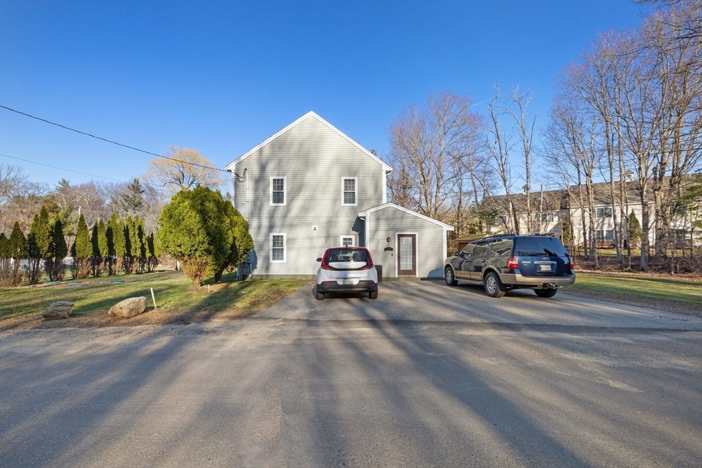 38 Brook Street Georgetown, MA 01833 - Photo 37 of 42 a car parked on the side of the road