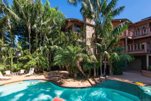 a view of yard with swimming pool