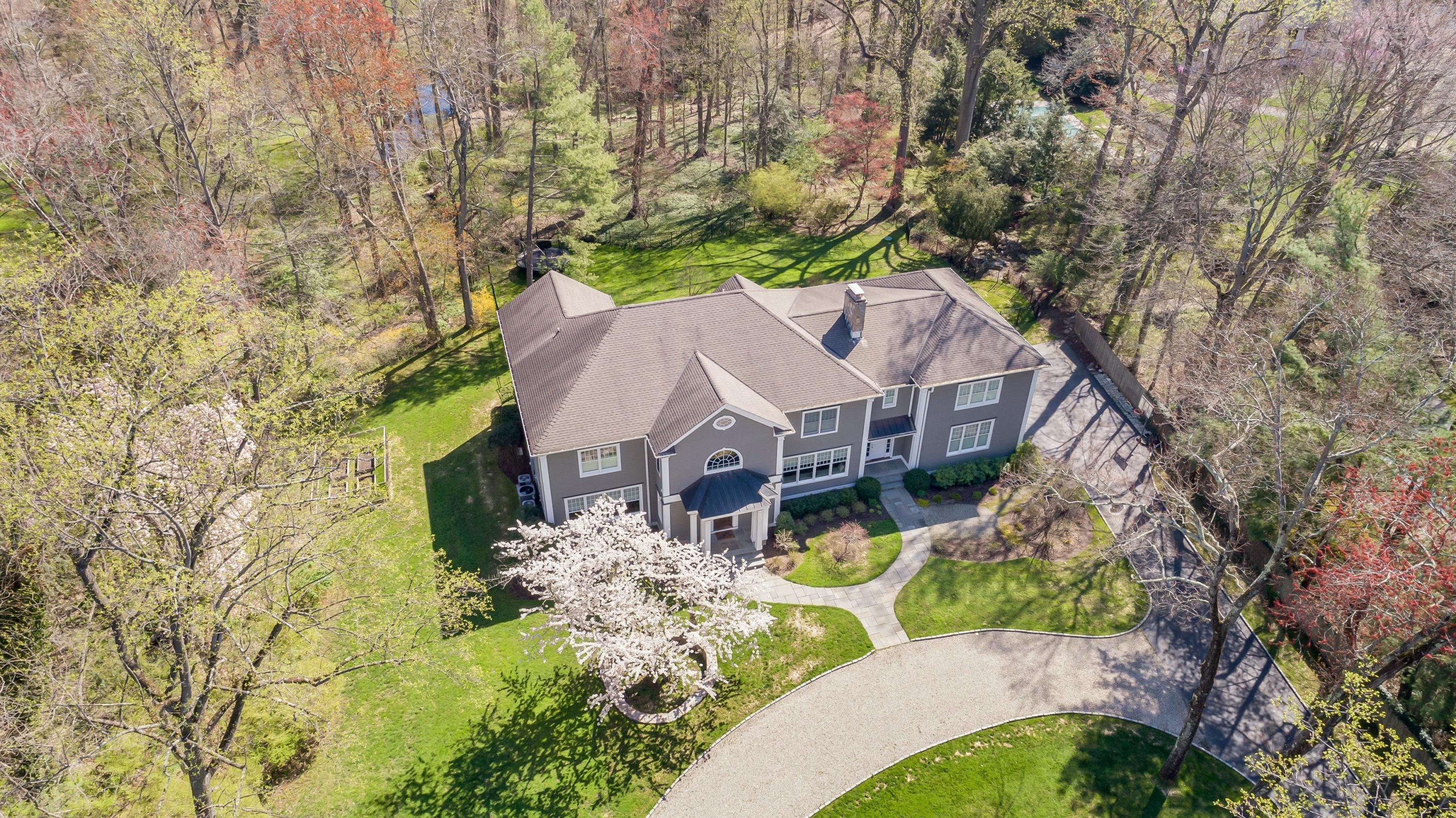 5 Old Parish Road Darien, CT 06820 - Photo 1 of 40 a aerial view of a house with a yard
