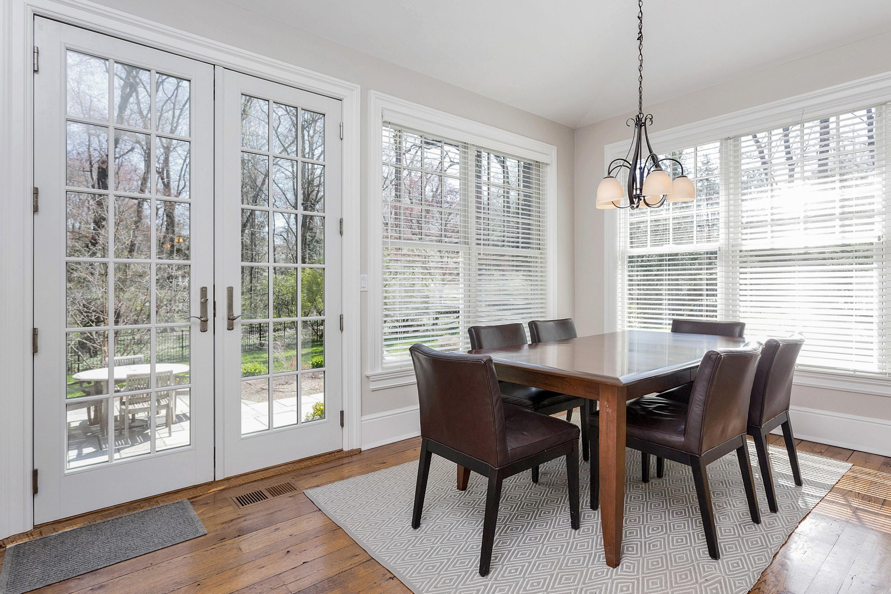 5 Old Parish Road Darien, CT 06820 - Photo 13 of 40 a view of a dining room with furniture window and wooden floor