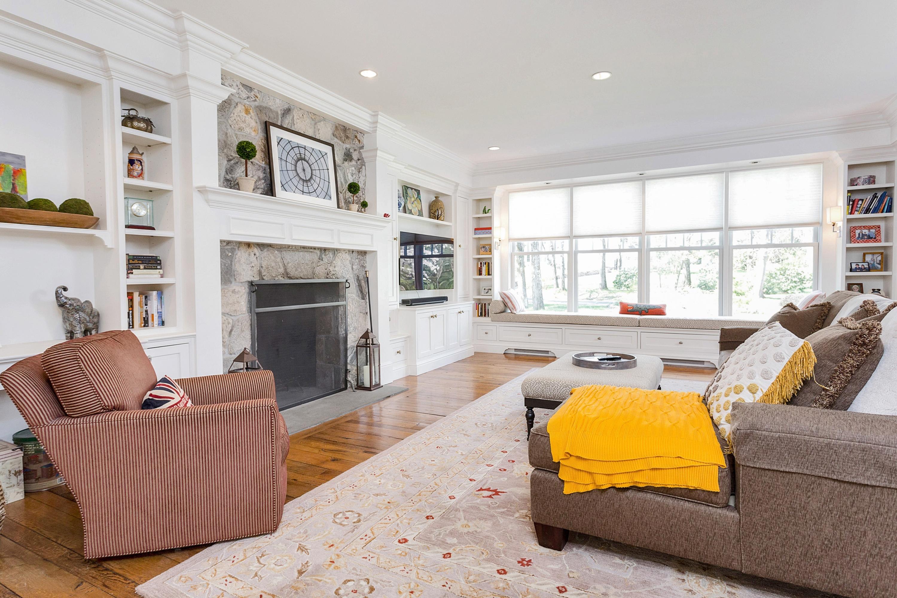 5 Old Parish Road Darien, CT 06820 - Photo 16 of 40 a living room with furniture and a fireplace