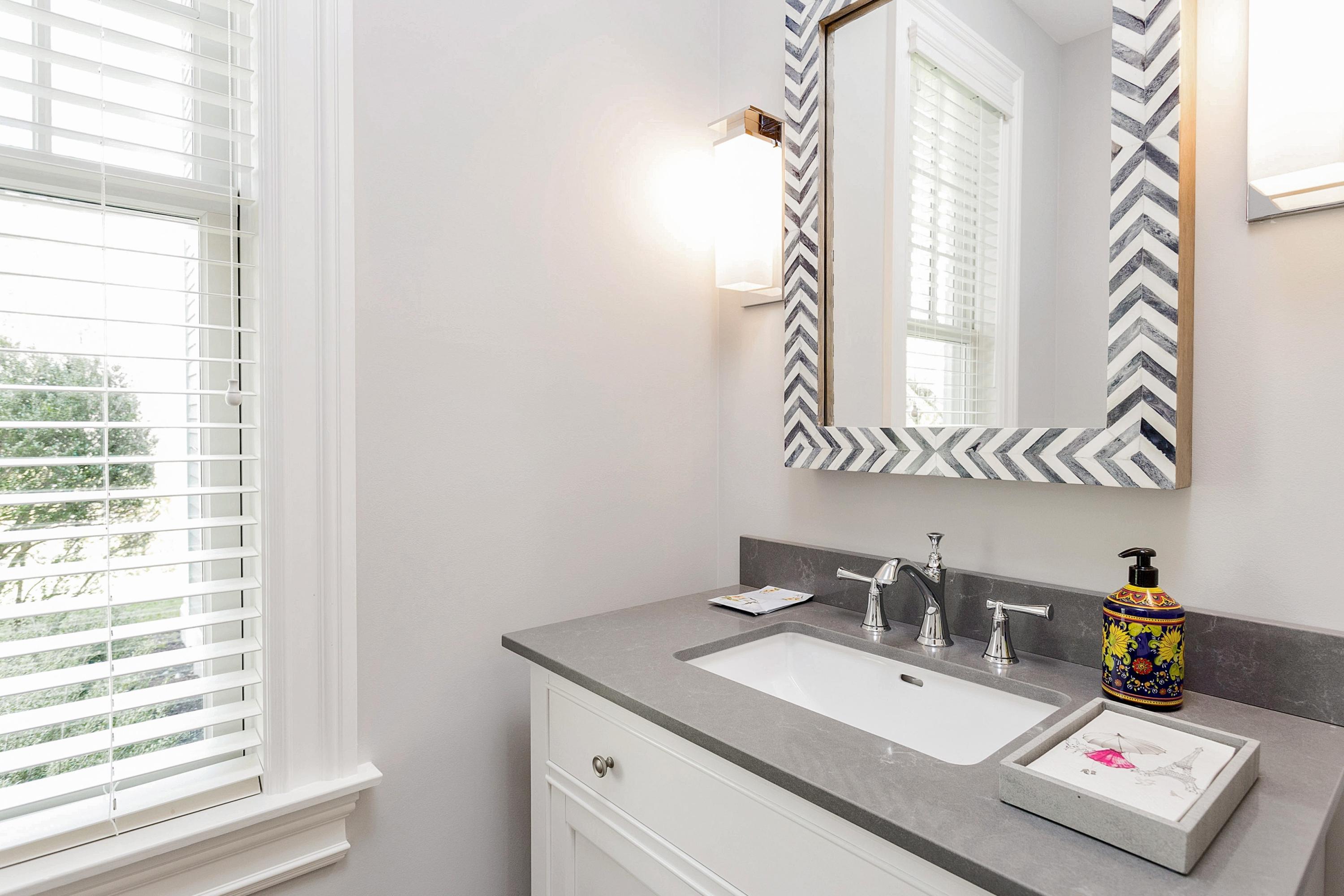5 Old Parish Road Darien, CT 06820 - Photo 19 of 40 a bathroom with a sink and a mirror