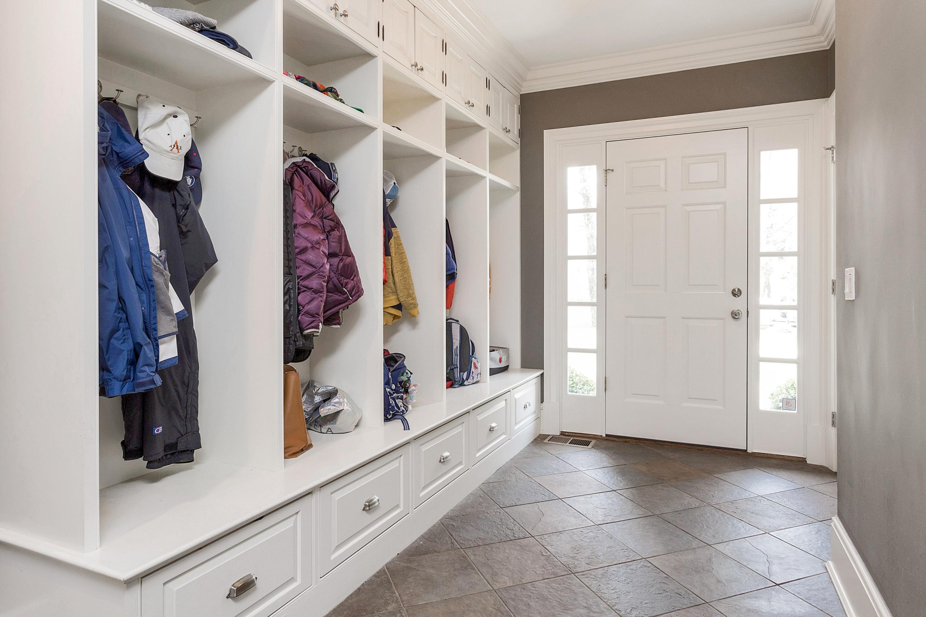 5 Old Parish Road Darien, CT 06820 - Photo 20 of 40 a view of walk in closet with clothes and shoes