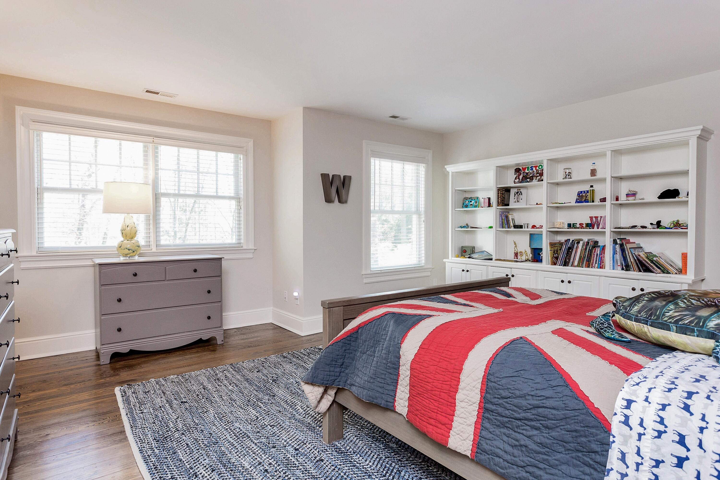 5 Old Parish Road Darien, CT 06820 - Photo 28 of 40 a bed room with a bed and a window