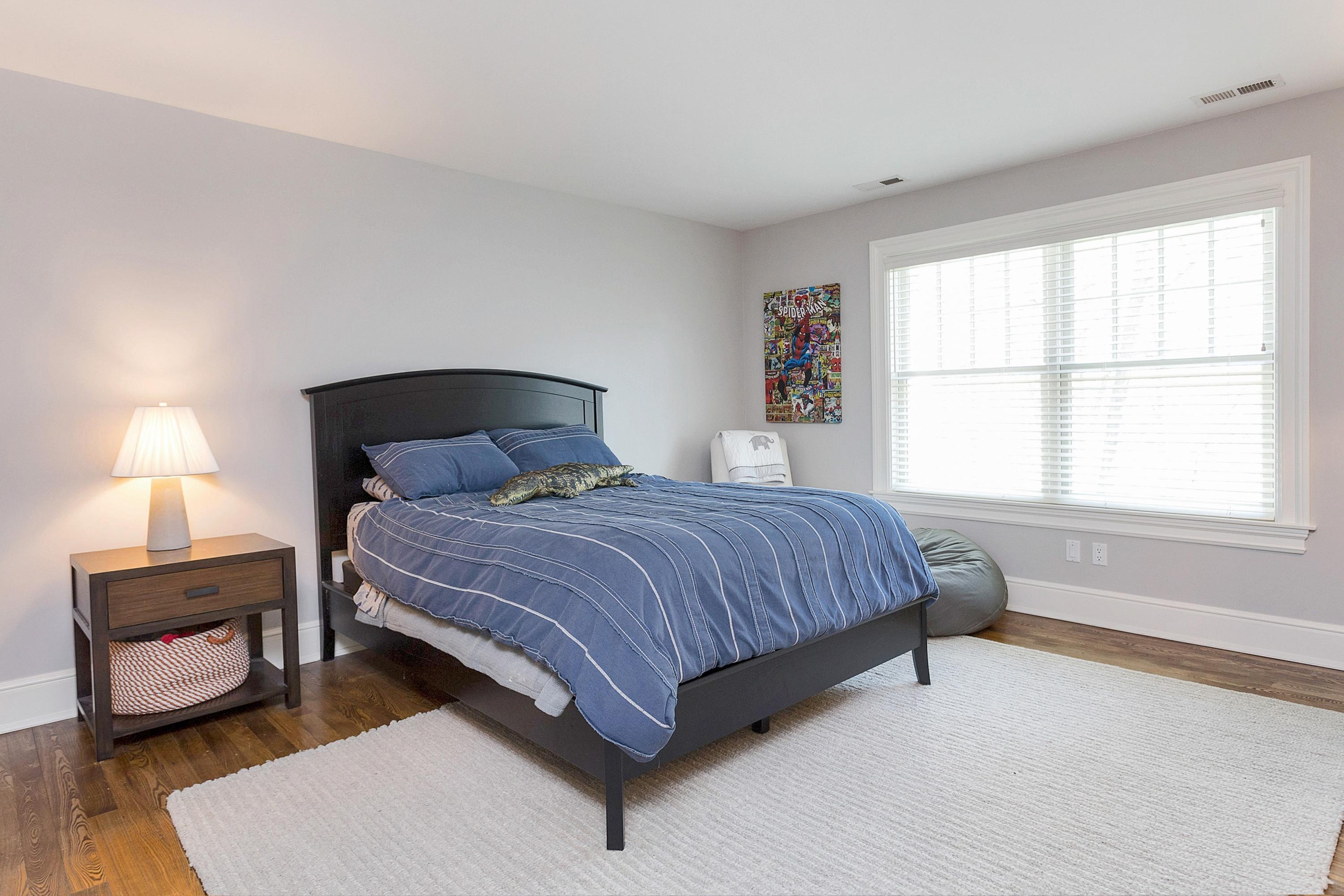 5 Old Parish Road Darien, CT 06820 - Photo 30 of 40 a bedroom with a bed and wooden floor