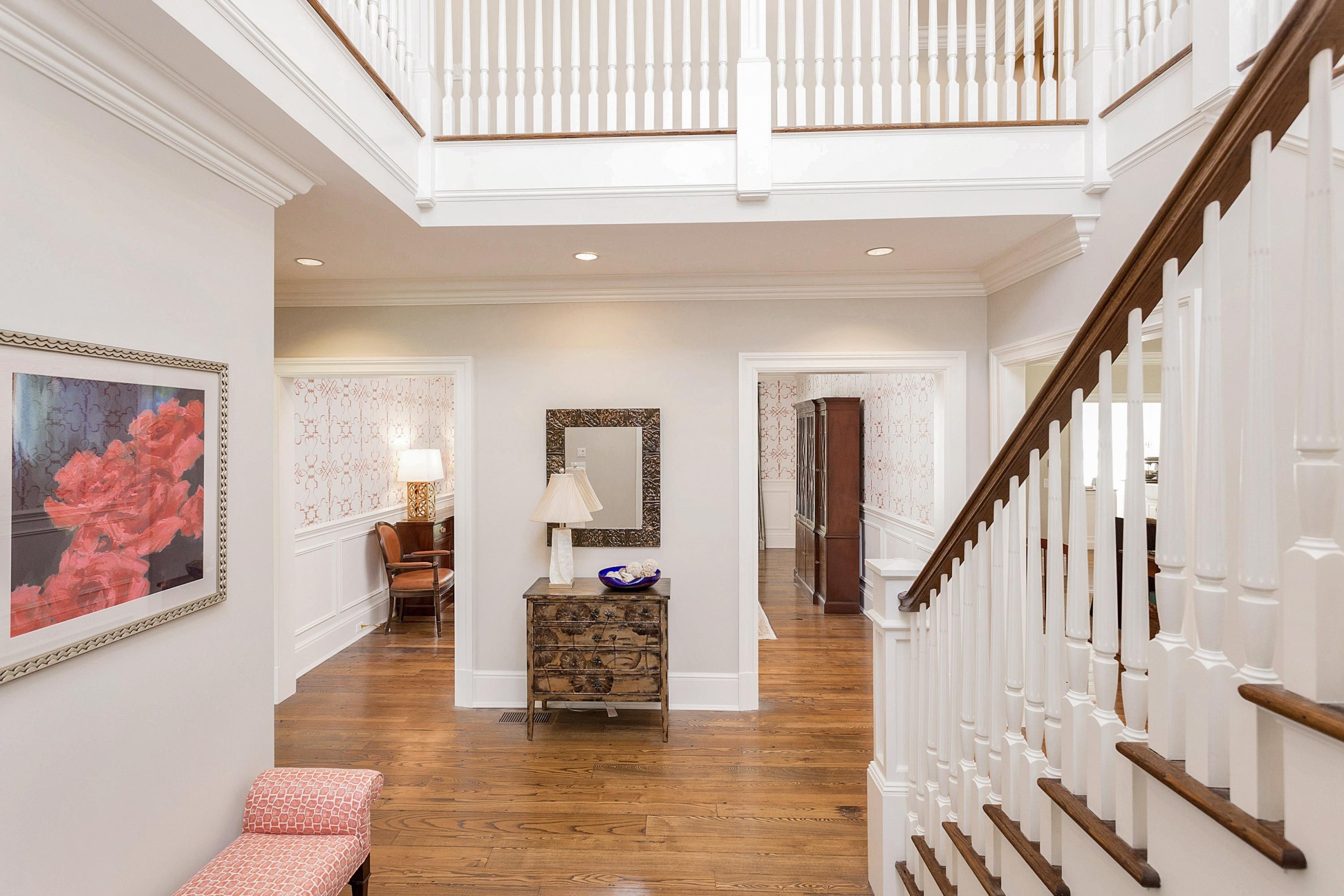 5 Old Parish Road Darien, CT 06820 - Photo 5 of 40 a view of livingroom with furniture and stairs