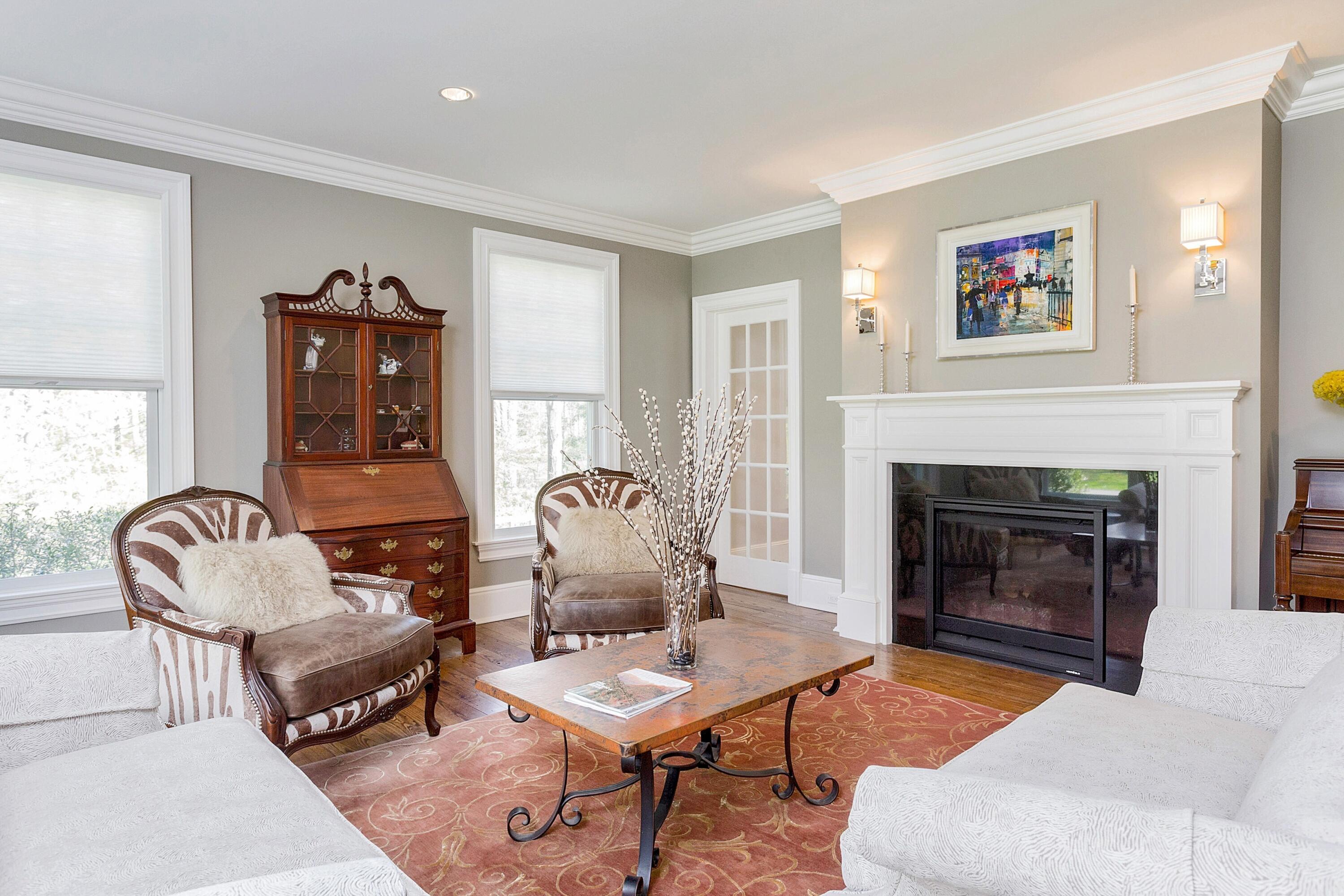 5 Old Parish Road Darien, CT 06820 - Photo 6 of 40 a living room with furniture and a fireplace