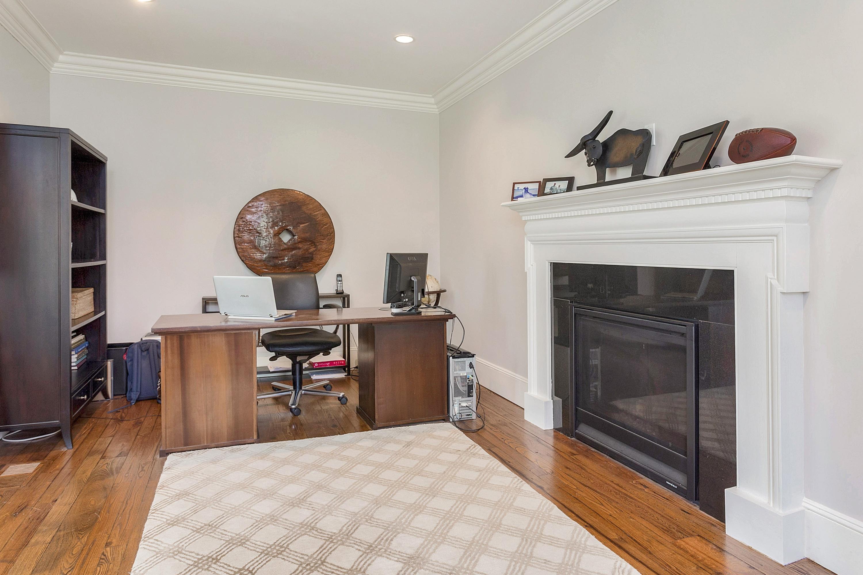 5 Old Parish Road Darien, CT 06820 - Photo 8 of 40 a living room with fireplace furniture and a fireplace