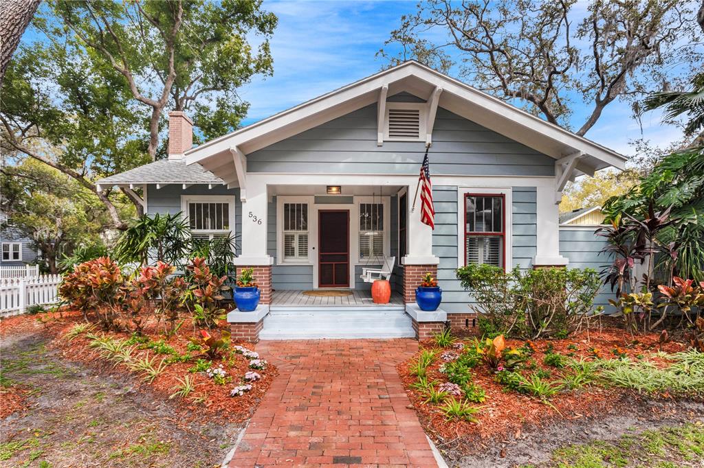 536 Scotland Street Dunedin, FL 34698 - Photo 1 of 1 a front view of a house with patio