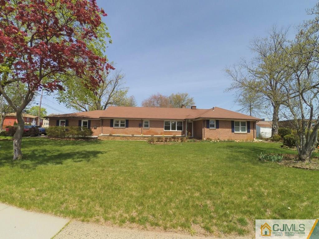 791 Hermann Road North Brunswick, NJ 08902 - Photo 1 of 14 a front view of a house with garden