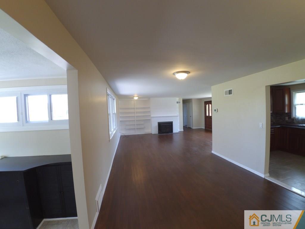 791 Hermann Road North Brunswick, NJ 08902 - Photo 14 of 14 a view of empty room with wooden floor