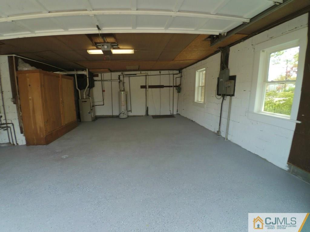 791 Hermann Road North Brunswick, NJ 08902 - Photo 7 of 14 a view of a livingroom with a ceiling fan and window