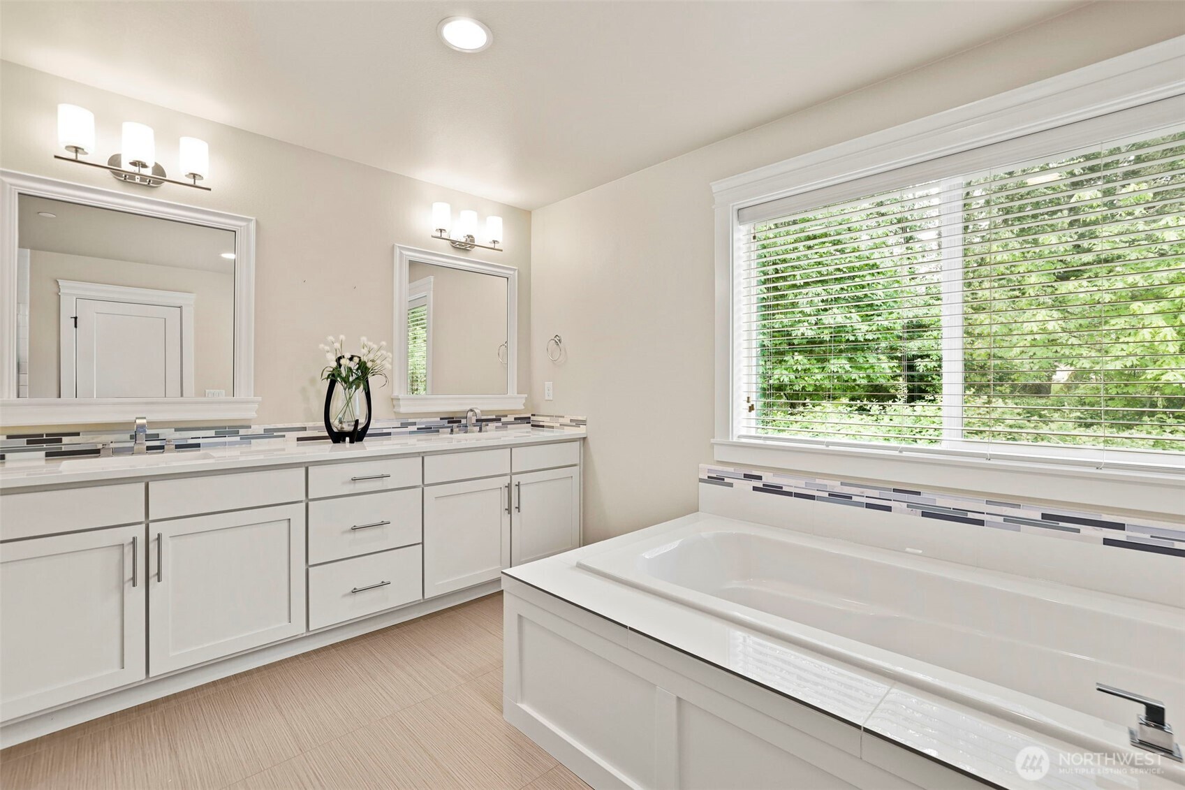 29 242nd Street Southeast Bothell, WA 98021 - Photo 19 of 40 a bathroom with a sink and a large mirror