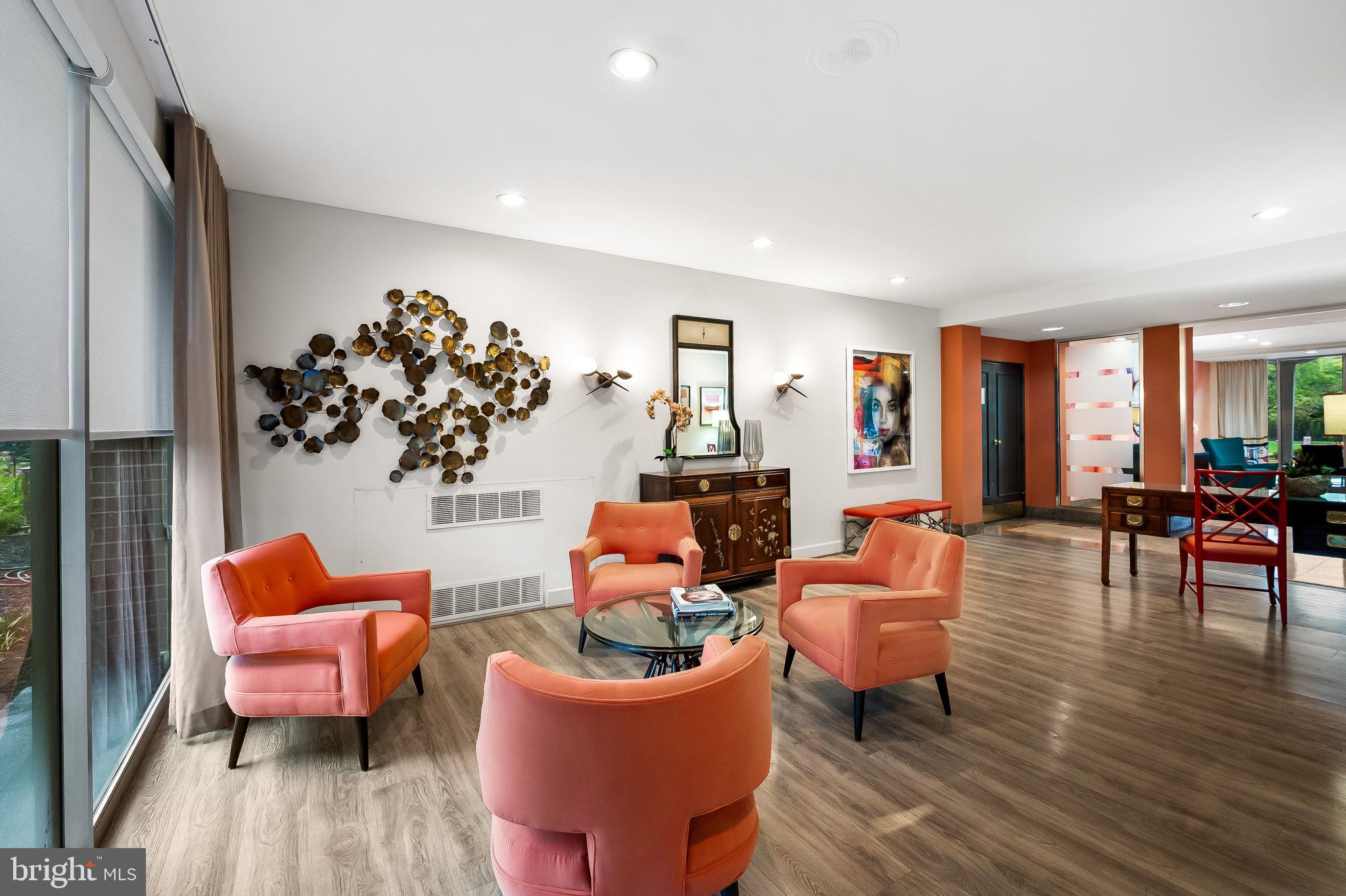 11 Slade Avenue, Unit 804 Baltimore, MD 21208 - Photo 32 of 37 sitting area off lobby