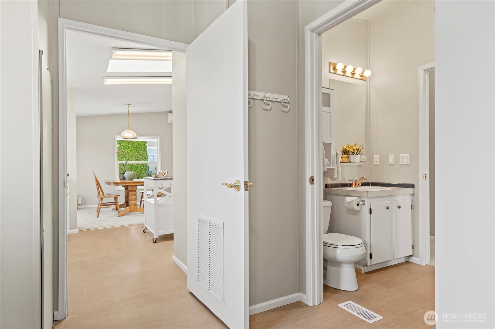 23825 15th Avenue Southeast, Unit 108 Bothell, WA 98021 - Photo 13 of 39 a en suite bathroom with a toilet sink and mirror
