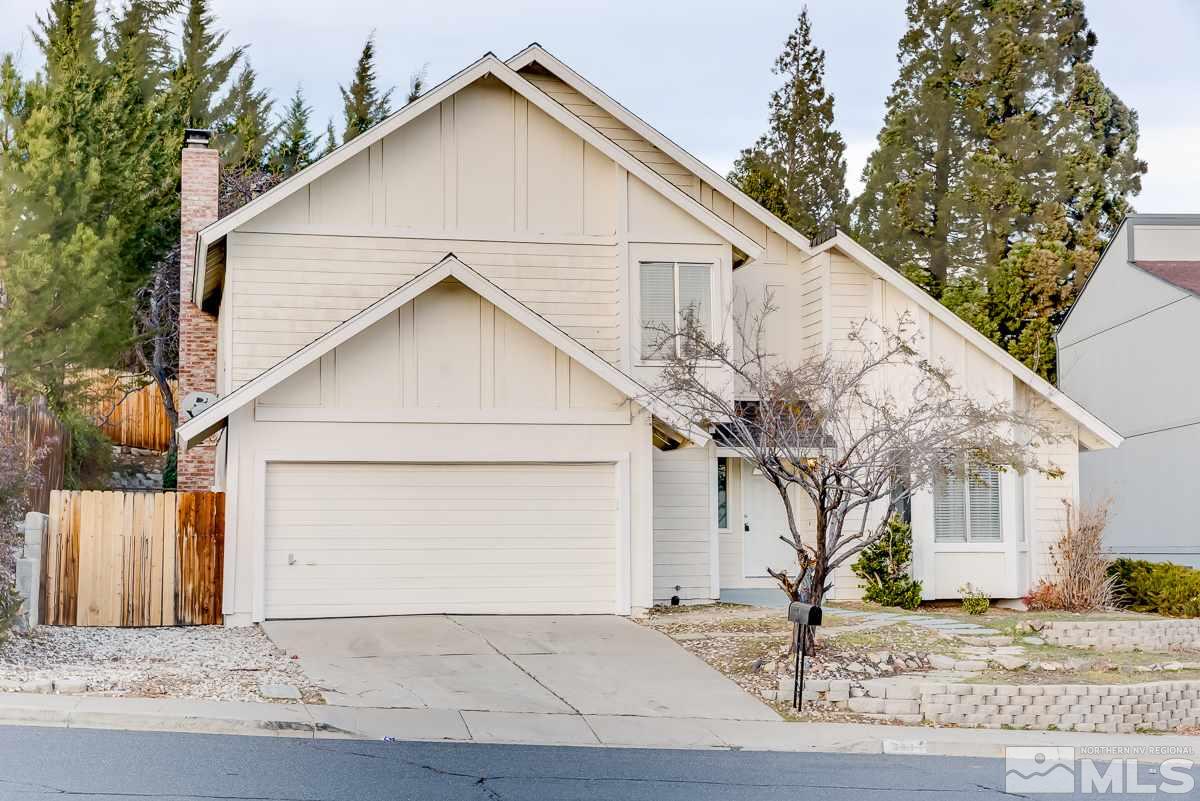 3805 Kings Row Reno, NV 89503 - Photo 1 of 1 a view of a white house with a small yard and large tree