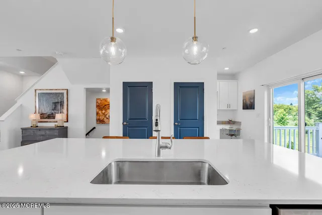 a bedroom with a bed and a table