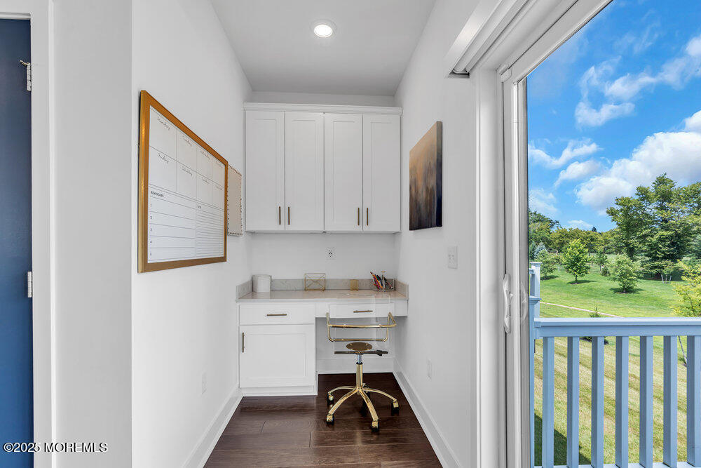63 Bataan Avenue Tinton Falls, NJ 07724 - Photo 29 of 64 a view of a hallway with washer and dryer