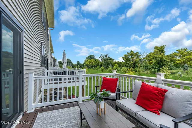 a bedroom with a bed and a television