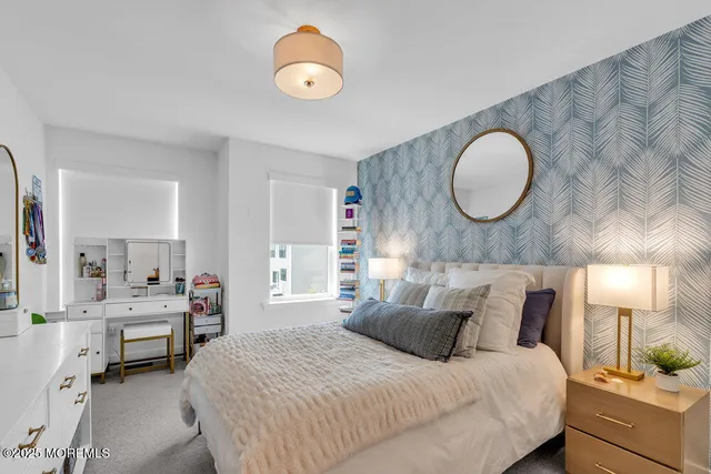 a view of a grassy field with trees