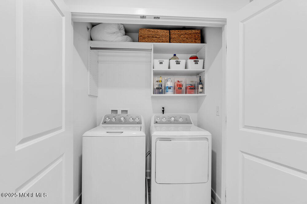 63 Bataan Avenue Tinton Falls, NJ 07724 - Photo 39 of 64 a utility room with dryer and washer