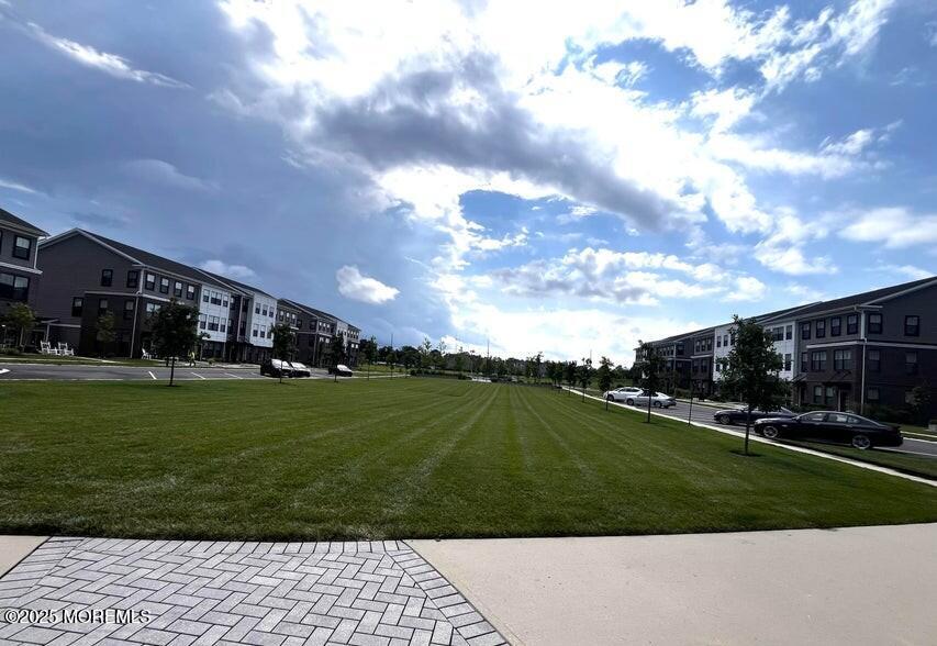 63 Bataan Avenue Tinton Falls, NJ 07724 - Photo 56 of 64 a city view with tall trees