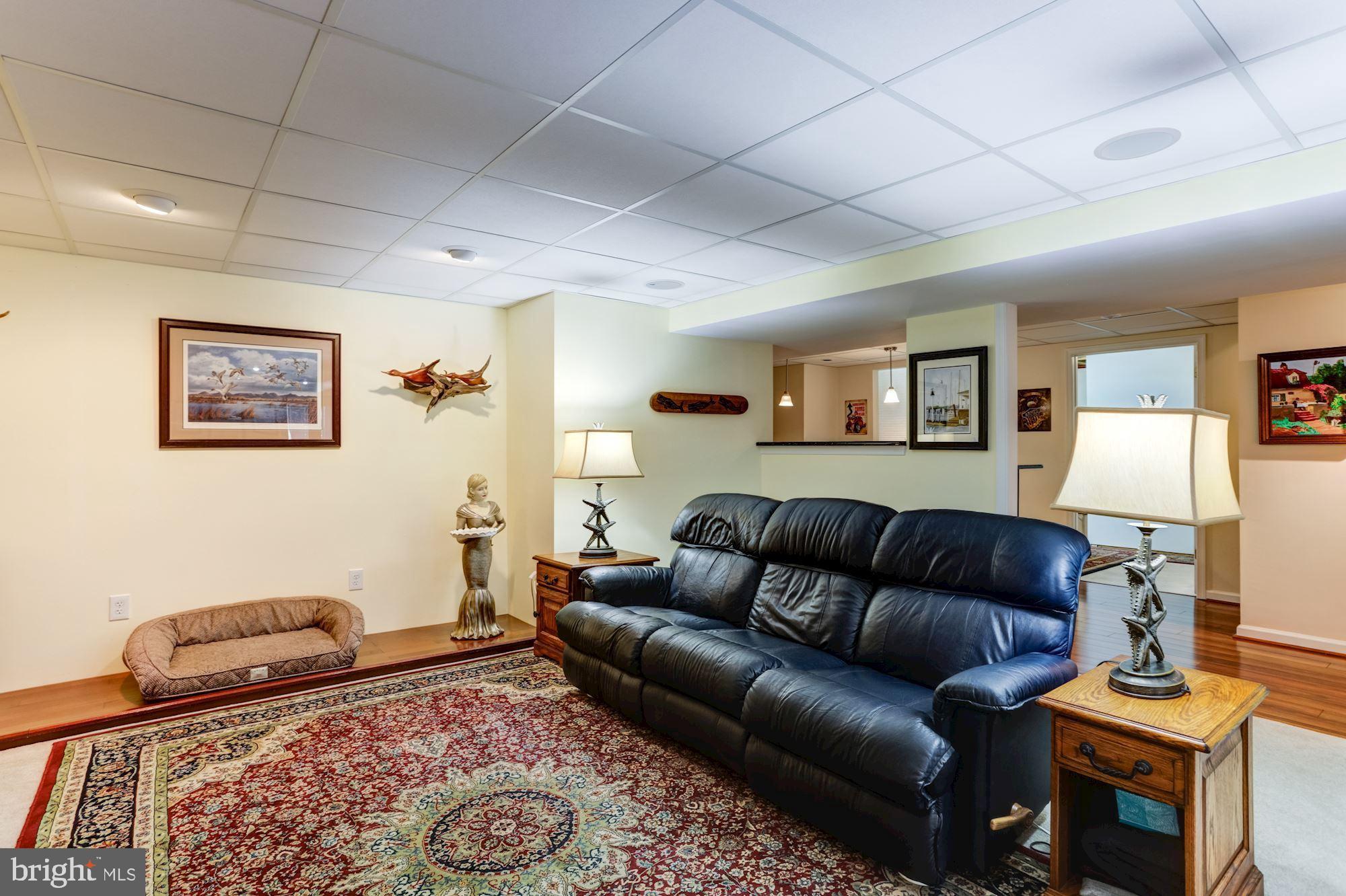 605 Havenhill Road Edgewater, MD 21037 - Photo 40 of 62 Lower Level TV area/ Family Room with carpet