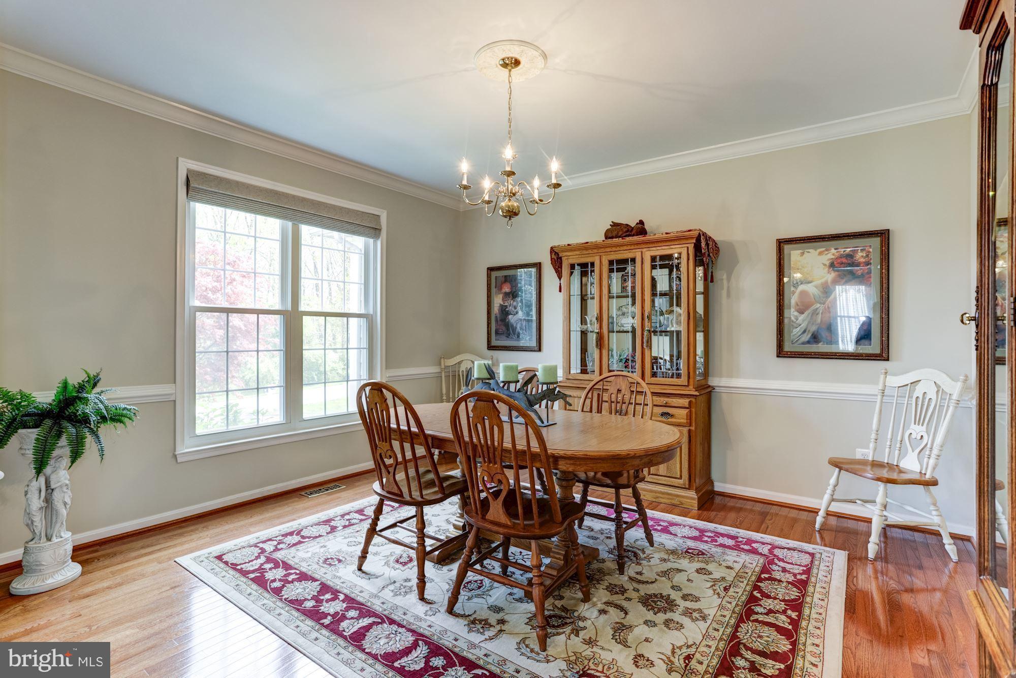 605 Havenhill Road Edgewater, MD 21037 - Photo 9 of 62 Formal Dining Room with crown moldings, chair rail
