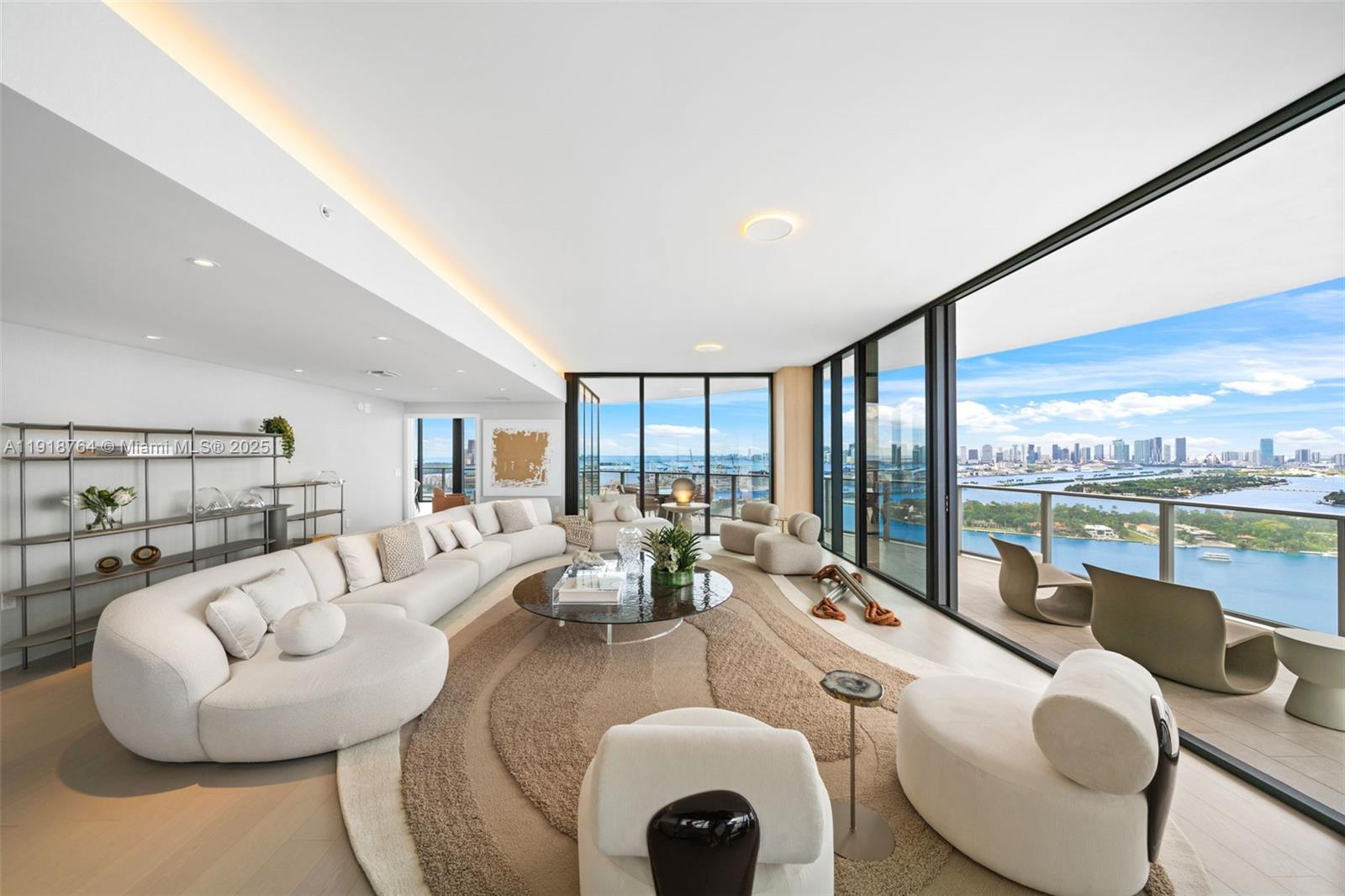 500 Alton Road, Unit 3402 03 Miami Beach, FL 33139 - Photo 11 of 77 a living room with furniture and a large window