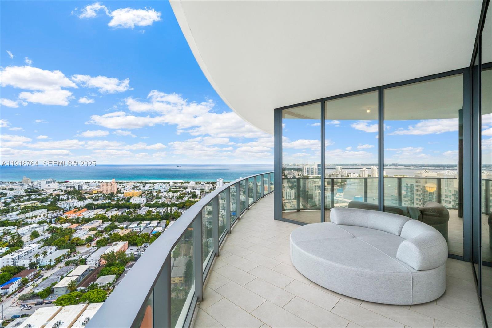 500 Alton Road, Unit 3402 03 Miami Beach, FL 33139 - Photo 14 of 77 a balcony with view of city