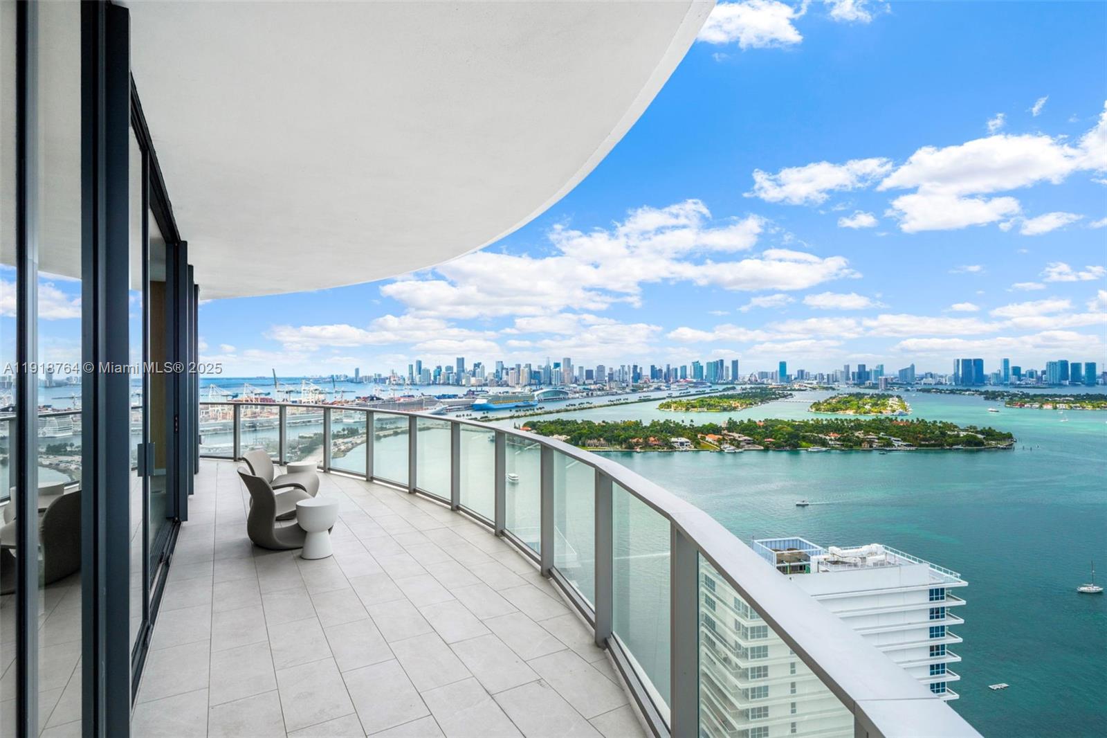 500 Alton Road, Unit 3402 03 Miami Beach, FL 33139 - Photo 28 of 77 a view of a lake with couches and city view
