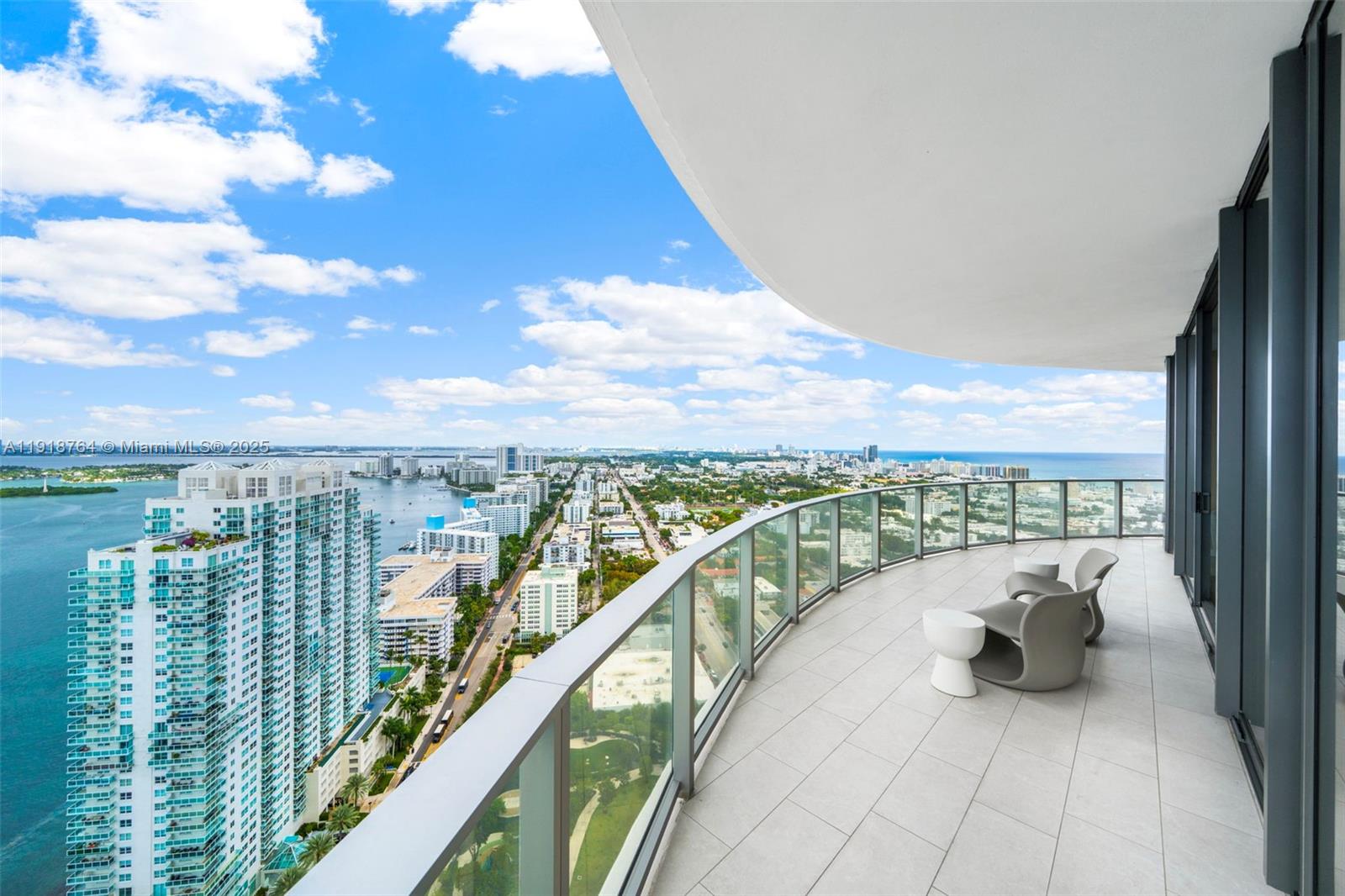 500 Alton Road, Unit 3402 03 Miami Beach, FL 33139 - Photo 29 of 77 a view of a balcony with city view