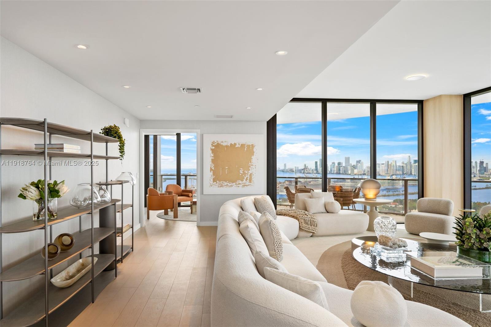 500 Alton Road, Unit 3402 03 Miami Beach, FL 33139 - Photo 34 of 77 a living room with furniture and floor to ceiling windows