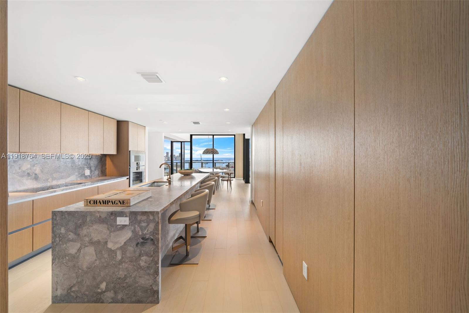 500 Alton Road, Unit 3402 03 Miami Beach, FL 33139 - Photo 38 of 77 a dining hall with stainless steel appliances granite countertop a sink and cabinets