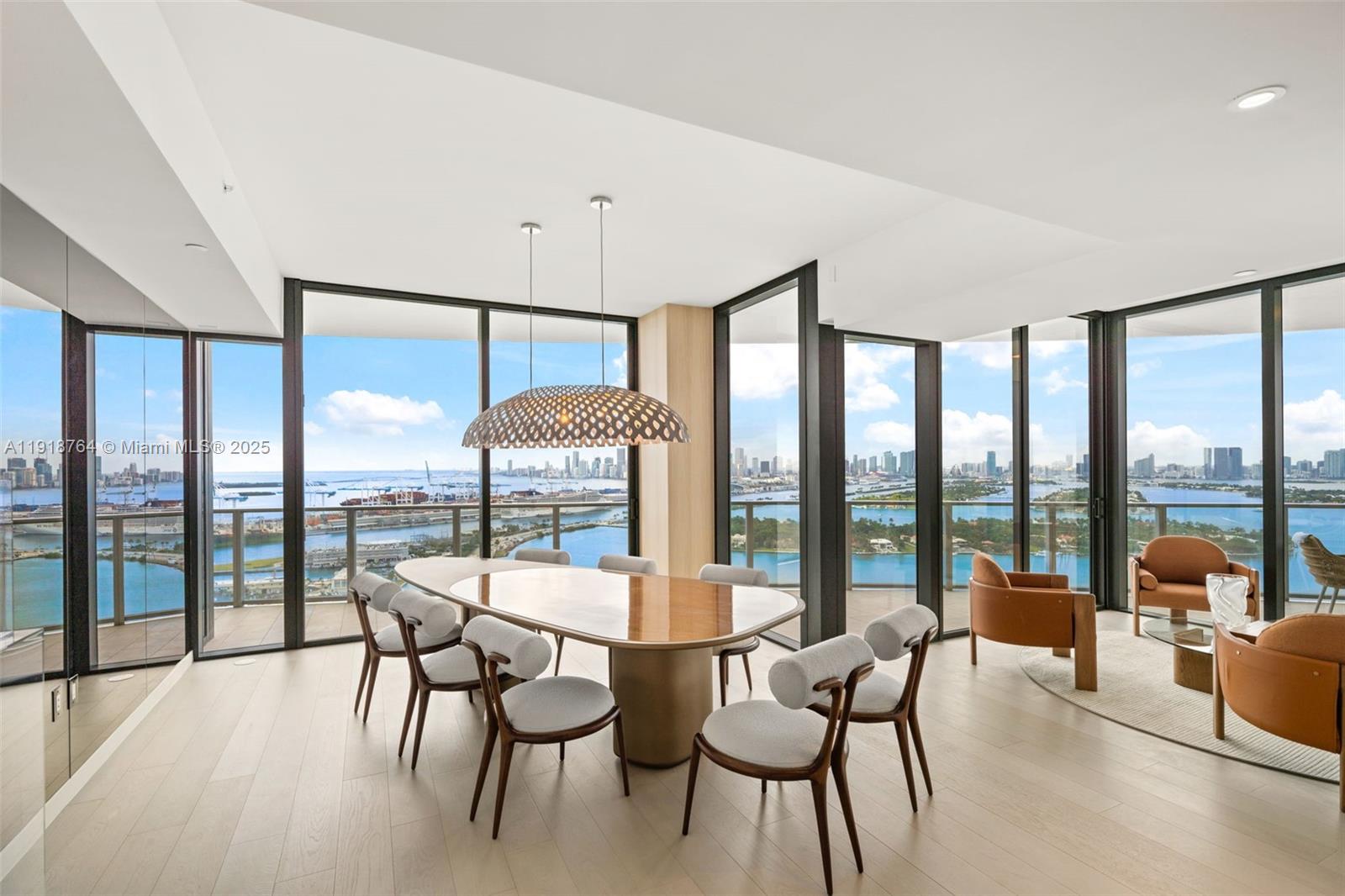 500 Alton Road, Unit 3402 03 Miami Beach, FL 33139 - Photo 43 of 77 a view of a livingroom with furniture and floor to ceiling window