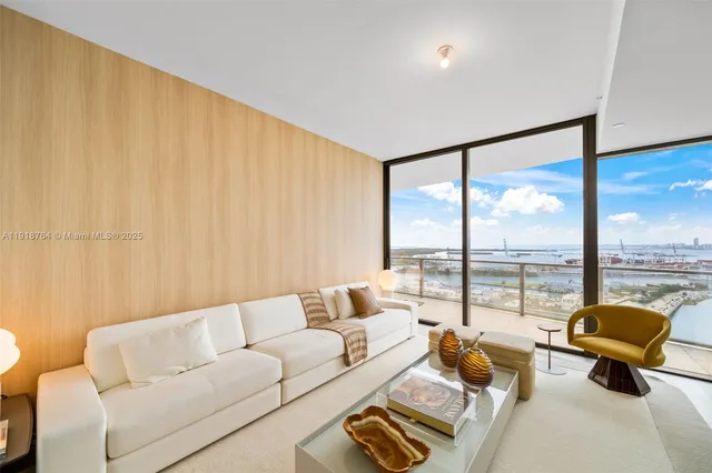 a view of an empty room with glass door