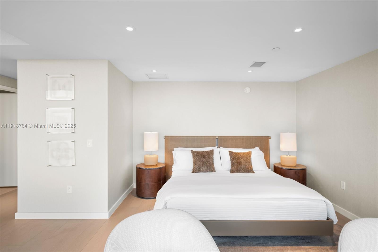 500 Alton Road, Unit 3402 03 Miami Beach, FL 33139 - Photo 57 of 77 a bedroom with a bed and painting on the wall