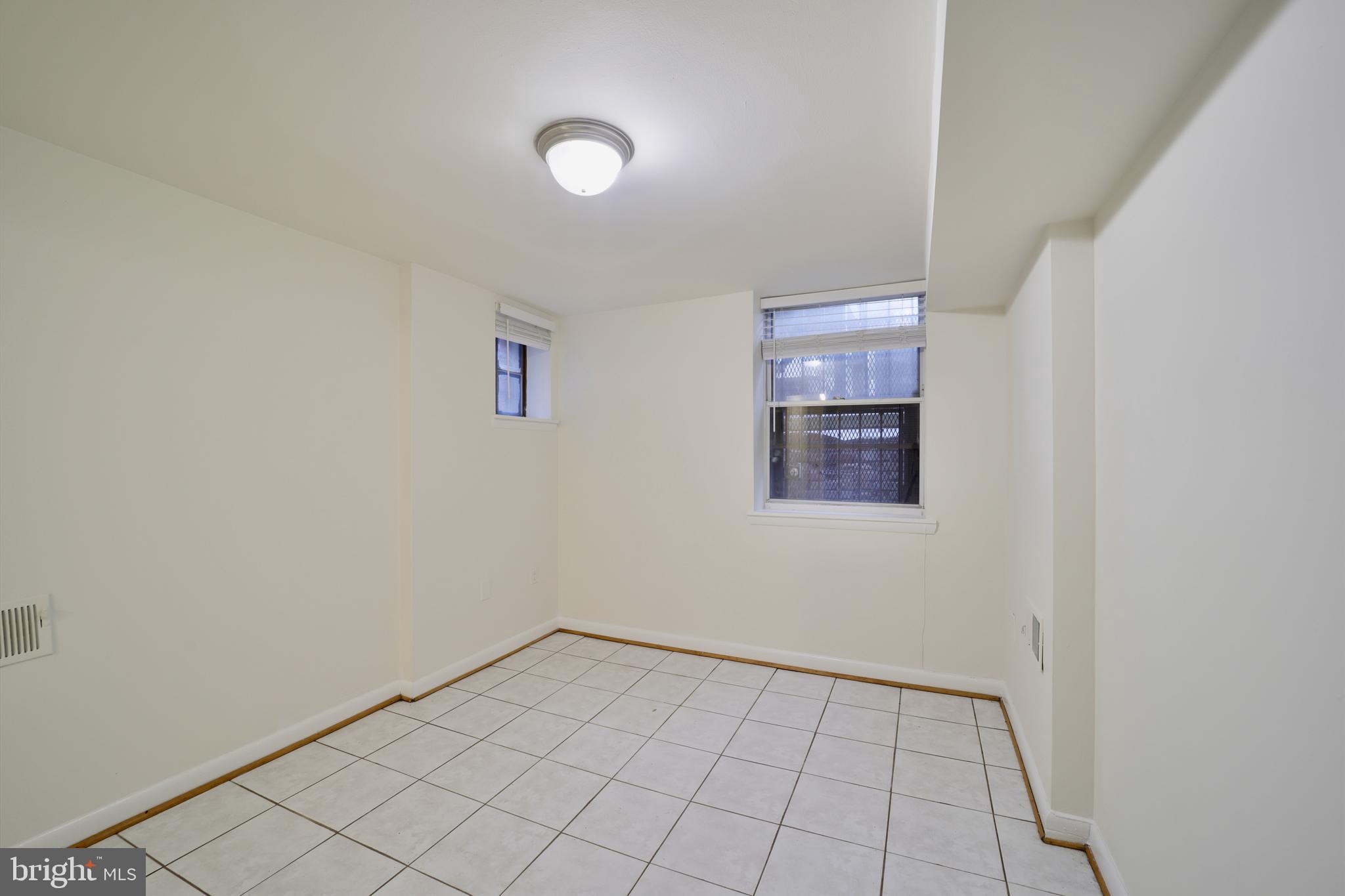 1926 15th Street Northwest, Unit 1 Washington, DC 20009 - Photo 12 of 13 a view of an empty room