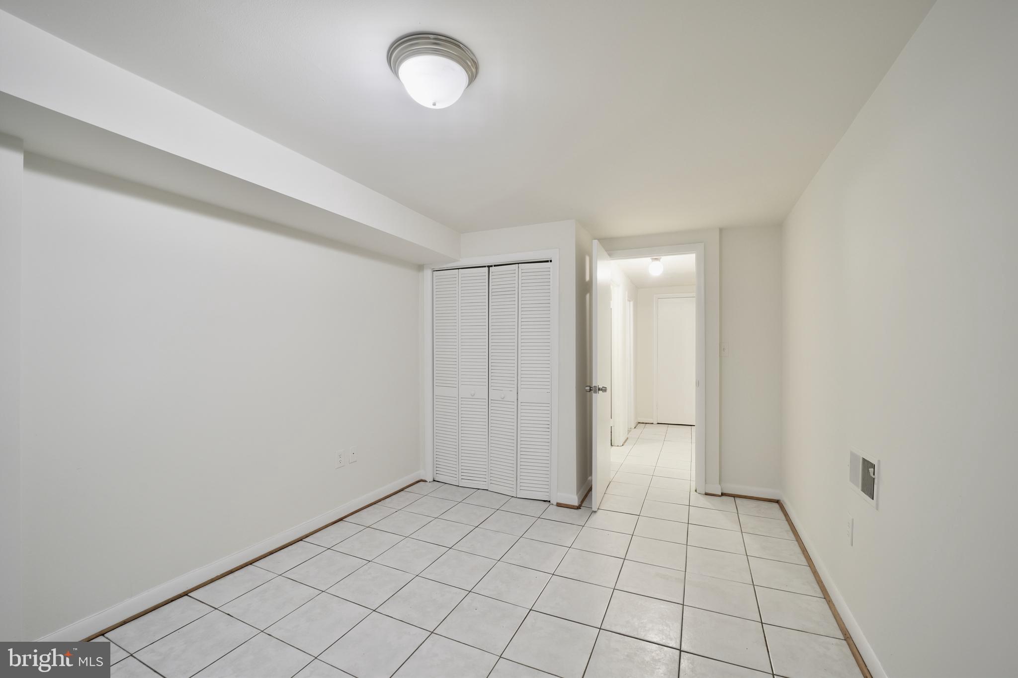 1926 15th Street Northwest, Unit 1 Washington, DC 20009 - Photo 13 of 13 a view of an empty room