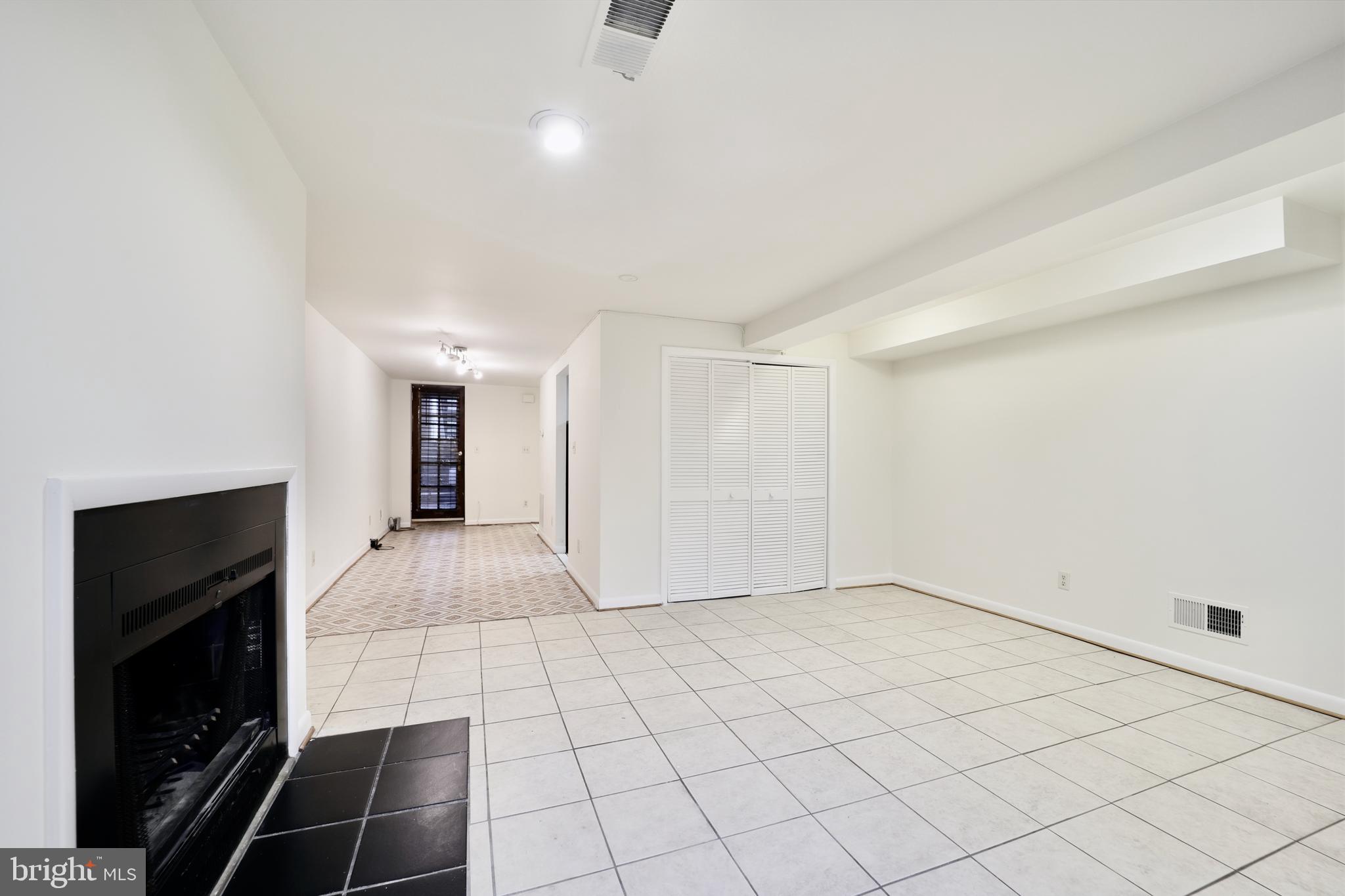 1926 15th Street Northwest, Unit 1 Washington, DC 20009 - Photo 2 of 13 a view of an empty room and window