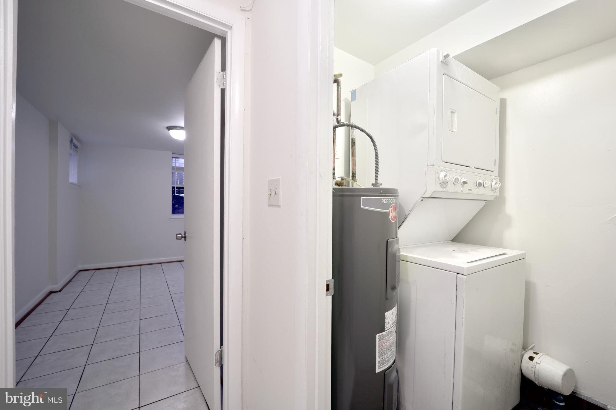 1926 15th Street Northwest, Unit 1 Washington, DC 20009 - Photo 9 of 13 a room with a washer and dryer